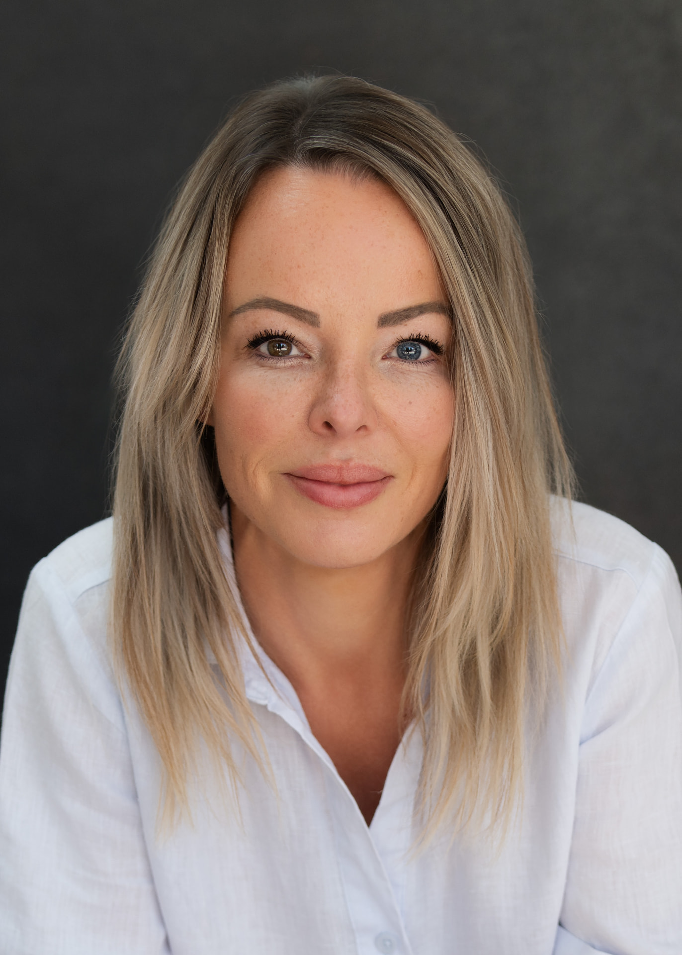 Karen Boswell, composed portrait in a white shirt